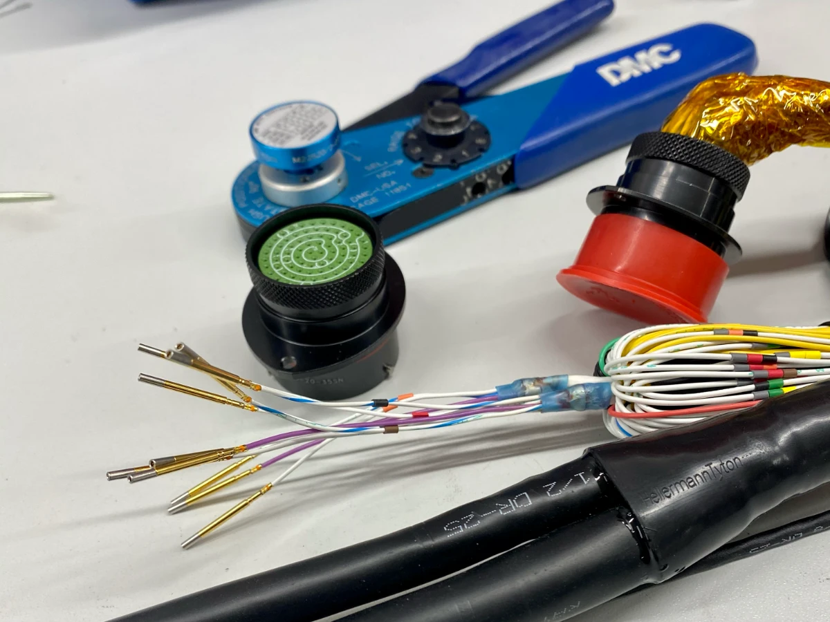 How To Build A Motorsport Wiring Loom — Materials, Techniques, And Process 5 Motorsport Connector Termination — Crimped Contacts Inserted Into Connector Housing With Strain Relief Boots Installed